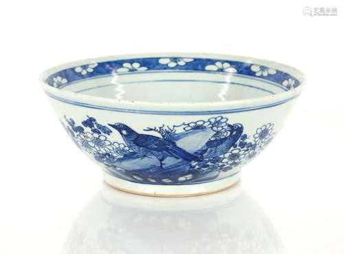 A large 19th Century Chinese blue and white bowl, decorated ...