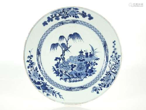 A large 19th Century Chinese blue and white charger, decorat...