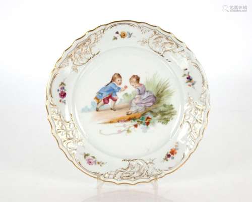 A Limoges dinner service, decorated children at play and fol...