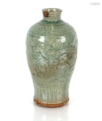 A Celadon ground baluster vase, having raised foliate decora...