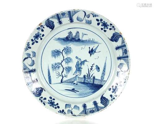 A mid 18th Century Bristol Delftware charger, painted in blu...