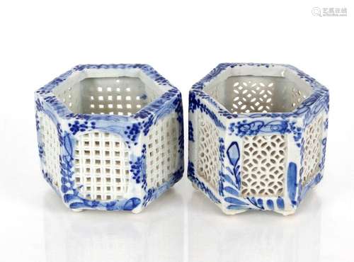 A near pair of Chinese porcelain hexagonal cricket cages, wi...