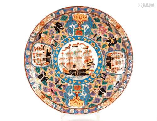 A Chinese saucer dish, decorated with a central sailing ship...