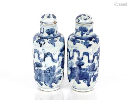 A pair of Chinese painted under glazed blue and white bottle...