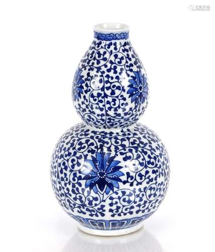 A Chines blue and white double gourd shaped vase, with all o...