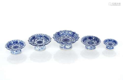 A matching collection of five Chinese blue and white pedesta...