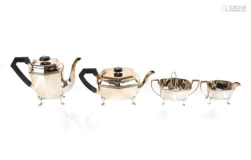 A modern silver four piece tea / coffee set, of panelled for...