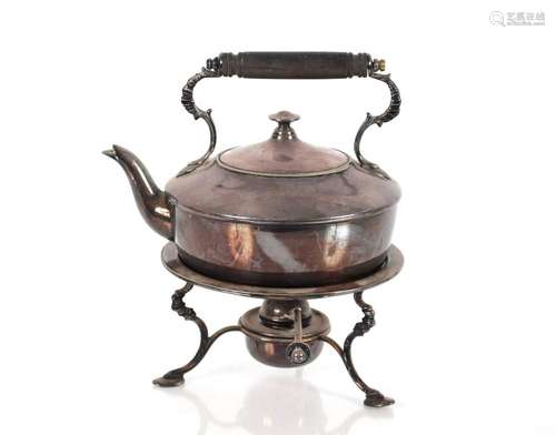 A plated tea kettle, on spirit heater stand of squat form wi...