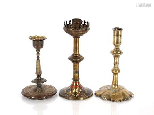 A Victorian Burgess style brass candlestick; an 18th Century...