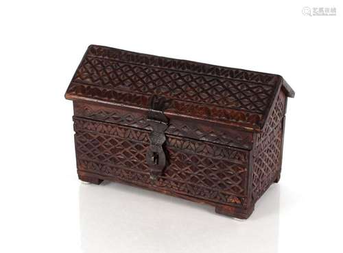 An Oriental carved wooden ark, with hinged angle lid and all...