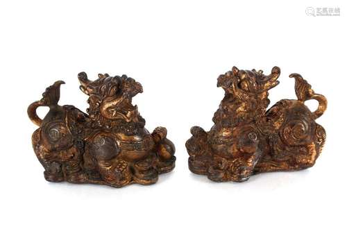 A pair of Chinese bronze models of Kylin, on plinth bases 12...