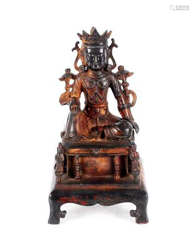 A Chinese bronze seated Buddha figure, 26cm high