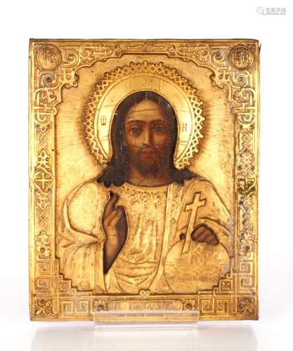 An Icon, depicting Christ with hand raised and orb, gilt riz...