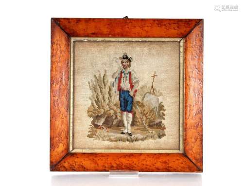 A pair of Victorian embroidered pictures, depicting man and ...