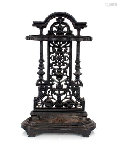 A Victorian cast iron stick stand, having pierced foliate de...