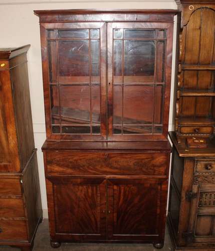 A Victorian mahogany secretaire bookcase, the upper adjustab...