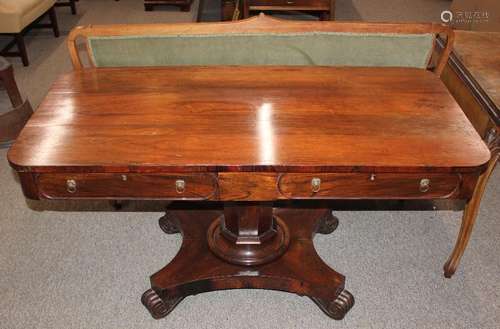 A 19th Century rosewood library table, fitted two frieze dra...