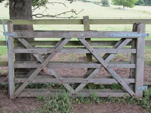 Two matching weathered softwood five bar paddock gates with ...