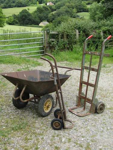 A large useful two wheeled wheelbarrow with pneumatic tyres,...