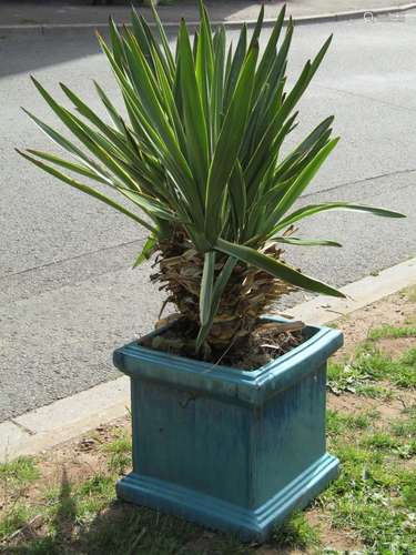 A contemporary turquoise glazed square cut and stepped garde...