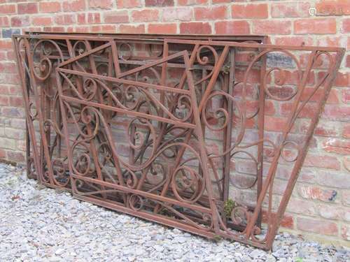 Five sections of iron work railing with matching open scroll...