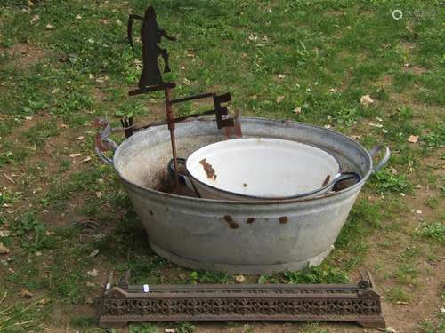 A vintage oval two handled galvanised steel bath together wi...