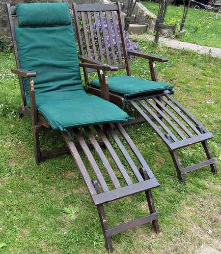 A pair of contemporary stained and weathered folding hardwoo...