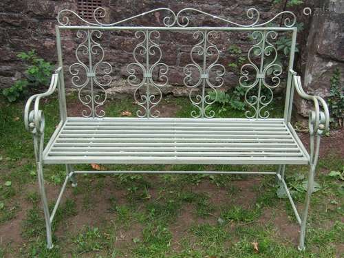 A contemporary light green painted aluminium garden bench wi...