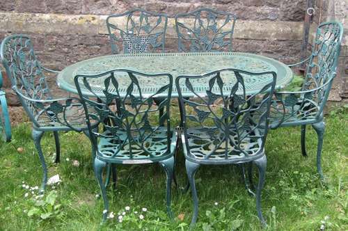 A contemporary green painted cast aluminium garden terrace t...