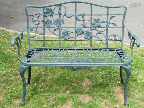 A contemporary green painted cast aluminium two seat garden ...