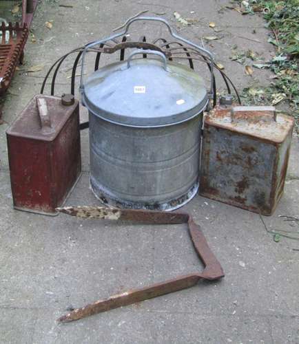 A vintage galvanised cylindrical bin with domed lid and loos...