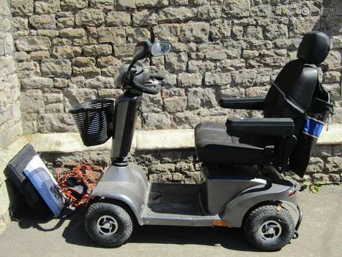 A Sterling S425 mobility scooter complete with charger and w...