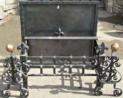 An antique style cast iron fire basket of rectangular form w...