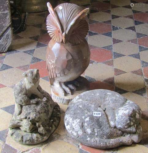 A well weathered cast composition stone ornament in the form...