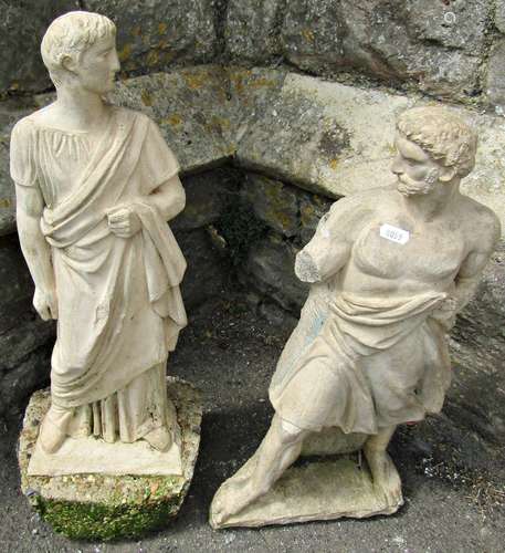 Two small buff coloured garden ornaments in the form of stan...