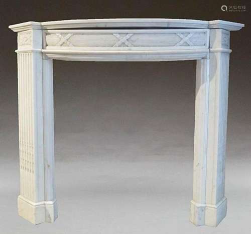 A Georgian white marble fire place with a curved mantle on r...