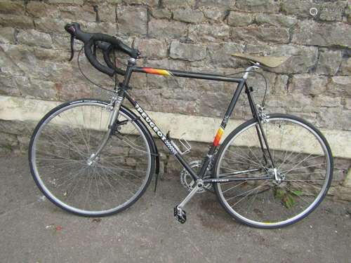 A vintage Peugeot lightweight racing cycle 12 speed with Bro...