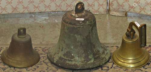 A 19th century bronze turret bell 20 cm diameter and two oth...