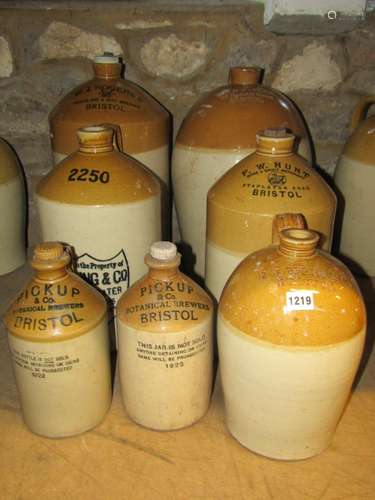 Seven vintage stoneware flagons of varying size and capacity...