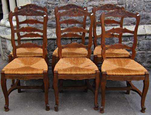 A set of six stained beechwood French provincial ladderback ...