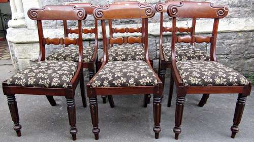 A set of six 19th century mahogany dining chairs with shaped...