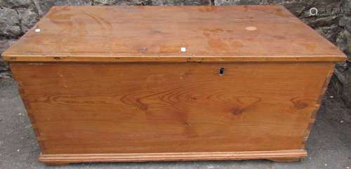 A 19th century stripped pine blanket box with hinged lid, dr...