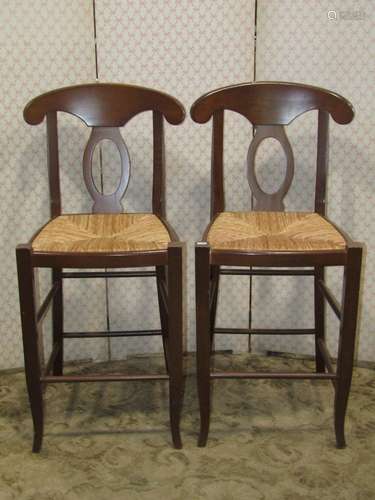 A pair of contemporary stained beechwood high chair back sto...