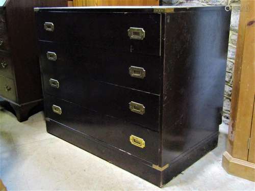 A low contemporary military style bedroom chest of four long...