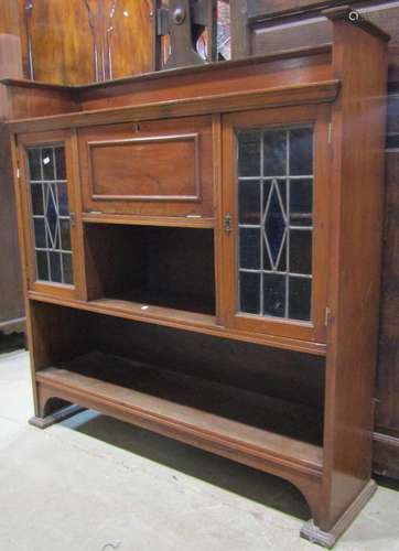 An Edwardian Arts & Crafts style walnut freestanding bur...