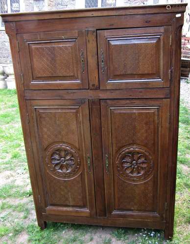 An antique oak side cupboard freestanding and enclosed by tw...