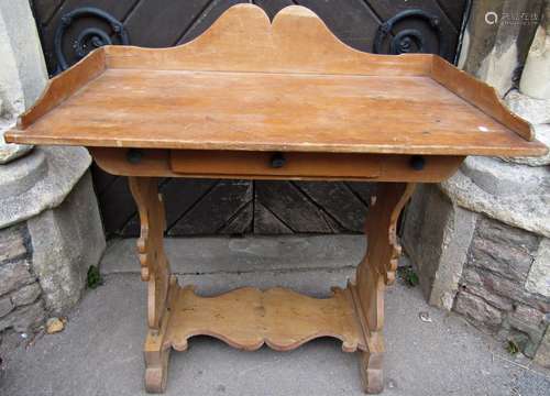 An unusual Victorian stripped pine washstand with raised thr...