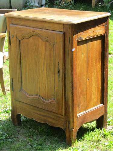 A small 18th century oak side cupboard enclosed by a moulded...