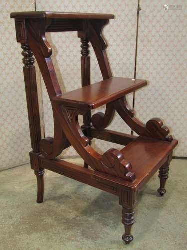 A reproduction mahogany three tread flight of library/bed st...