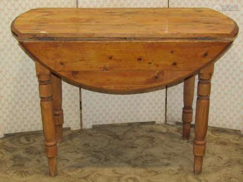 A late Victorian stripped pine Pembroke type table fitted wi...